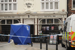 Police outside The Old Still Inn in King Street, Wolverhampton, after the incident