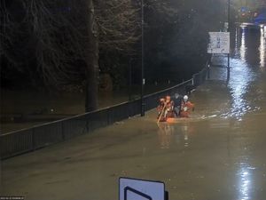 Supporting image for story: Stumbling walker helped from Shrewsbury floods during dramatic late-night rescue
