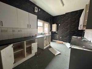 The kitchen is large and spacious, but needs a lot of work