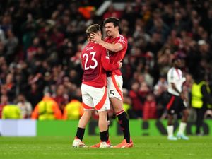 Manchester United’s Luke Shaw and Harry Maguire celebrate