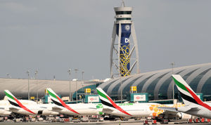 Emirates aircraft are pictured at Dubai international Airport. (Photo by KARIM SAHIB/AFP via Getty Images)