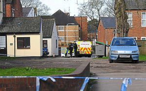 Police at the scene of the incident in Compton Road