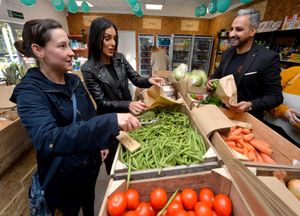 The opening of the 'All Nations Community Grocery' in Telford. Pictured are Rick and Sarah Kaul, who are behind the initiative, chatting to customer Amy Clarke