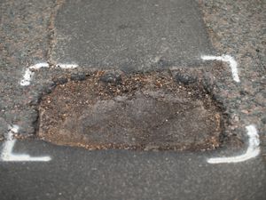 Supporting image for story: Pothole playground: What to do if you hit one of these car-killing menaces