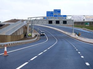 Supporting image for story: Three people including police officer fighting for lives after M8 hit-and-run