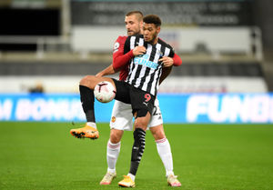Newcastle United's Joelinton (front)