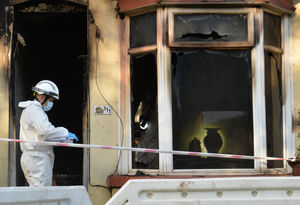 The two men were trapped inside the house until being rescued by fire crews