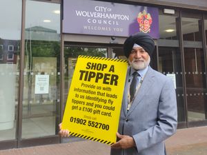 Councillor Bhupinder Gakhal, cabinet member for resident services at Wolverhampton Council, with contact details for the Shop a Tipper scheme