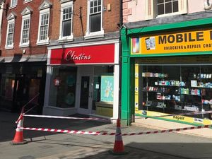 Supporting image for story: Area taped off around Shrewsbury card shop due to loose tile