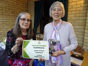 Joy Killick, Rolleston-on-Dove WI  receiving the Lichfield Mercury Cup for Floral Art