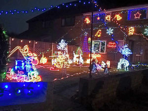 Supporting image for story: Shropshire couple's Christmas lights raise money for charity that helps grandson