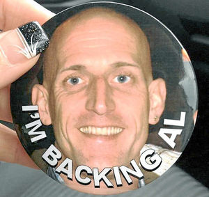A badge with the phrase 'I'm backing Al