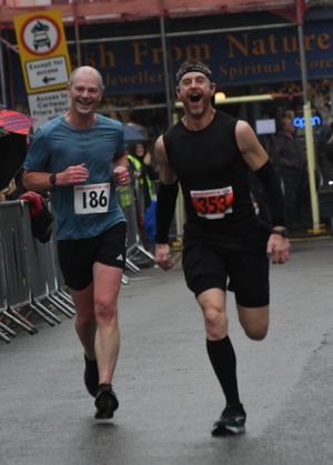 It’s all smiles as Simon Chesters and Newport and District Running Club’s David Thomas sprint for the line, Simon winning this battle.