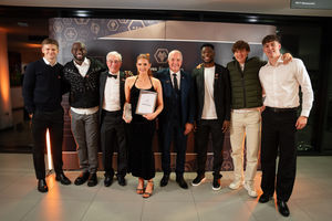 Spirit of Wolves winner Daisy Hackney pictured with Wolves Foundation honorary patrons Steve Bull and John Richards, and players from the first team.
