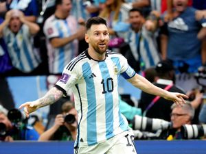 Argentina’s Lionel Messi celebrates scoring against France in the 2022 World Cup final