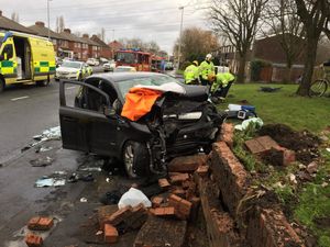 Supporting image for story: Three seriously injured as two cars crash into wall