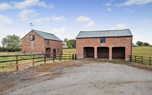 Outbuildings including a car port. Picture: Savills/Rightmove