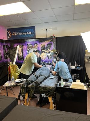 Tattoo artists were working over both days on artwork