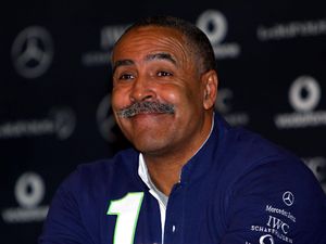 Daley Thompson head and shoulders, smiling