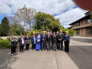 Veterans, Royal British Legion members and Llandrindod Wells Town Crier Jan Swindale at County Hall for its VE Day service. Image Rachael Barlow