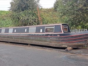 Supporting image for story: Hunt for owner as NARROW BOAT is dumped on footpath