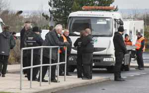 Enforement officers keep an eye on travellers, on the car park, at Showcase Cinema, Dudley