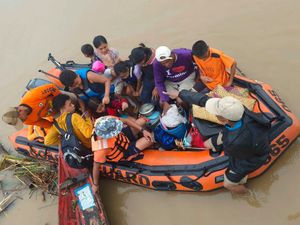 Supporting image for story: At least 24 people dead as tropical storm batters Philippines