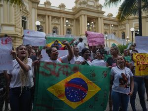 Supporting image for story: Protests after police raid leaves at least 121 dead in two Rio slums
