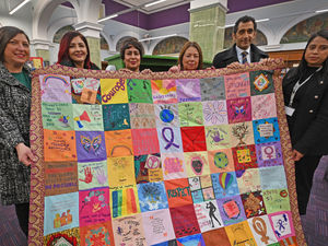 Supporting image for story: Quilt of hope aims to highlight crimes and abuse against women.