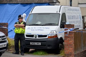 Police cordoned off the house in Cradley Road in the aftermath of Mr Johnson's death