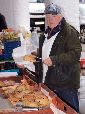 Dave Jay of Hodnet at the stall of Nicky's Menu selling scones and so on