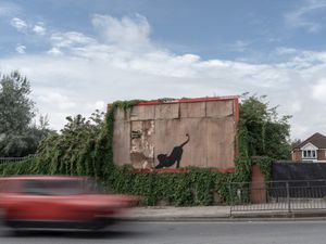Supporting image for story: Banksy unveils stretching cat design as animal-themed collection continues
