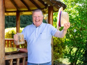 Gary MacDonald toasts his win