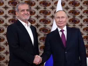 Supporting image for story: Russian and Iranian leaders meet before signing partnership treaty