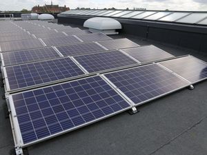 Solar panels on the roof of a new school in Hornechurch, east London (PA)