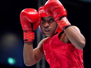 Supporting image for story: Cindy Ngamba hopes first-ever medal for refugee team will inspire others