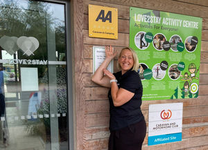 Love2Stay joint manager Charlie Ward with the new AA Five Star grading plaque.