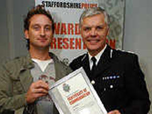 Supporting image for story: Hero honoured for foiling robber
