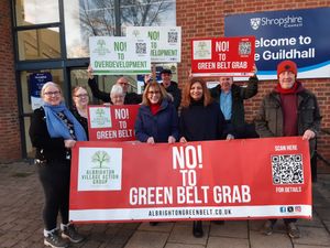 Campaigners celebrate the news that a controversial scheme for 800 homes in Albrighton was unanimously turned down. Picture: LDRS