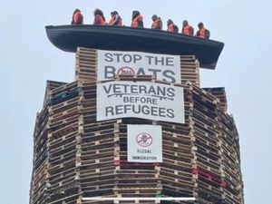 Supporting image for story: Calls for removal of migrant effigies in boat placed on loyalist bonfire in NI