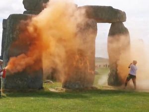 Supporting image for story: Third person arrested after orange paint powder sprayed at Stonehenge