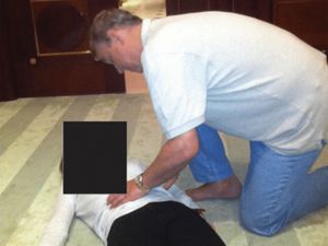 Supporting image for story: Pictures appear to show Andrew crouched over woman in latest Epstein files dump