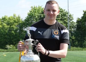 Jason Jones with the trophy