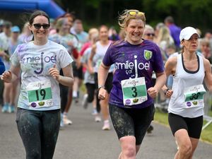 Supporting image for story: Hundreds take part in annual charity run to honour three generations of family killed in terror attack