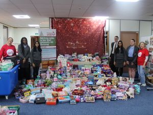 Supporting image for story: School students hand over nearly 1,000 presents to Christmas appeal
