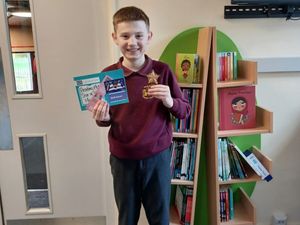 Supporting image for story: Rugeley pupil celebrates winning national award for reading excellence