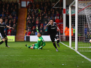 Adam Hammill celebrates Barnsley's opener against Walsall at Bescot. (Photo by Clive Mason/Getty Images)