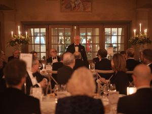 The King delivers a speech during the dinner.