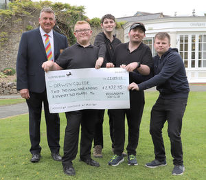 Students Dylan, Byron, Brendan and CJ were delighted to receive the cheque for £2,972.95 to Derwen College Charity from Bridgnorth Golf Club’s 2024-25 captain Tracy Edmonds.