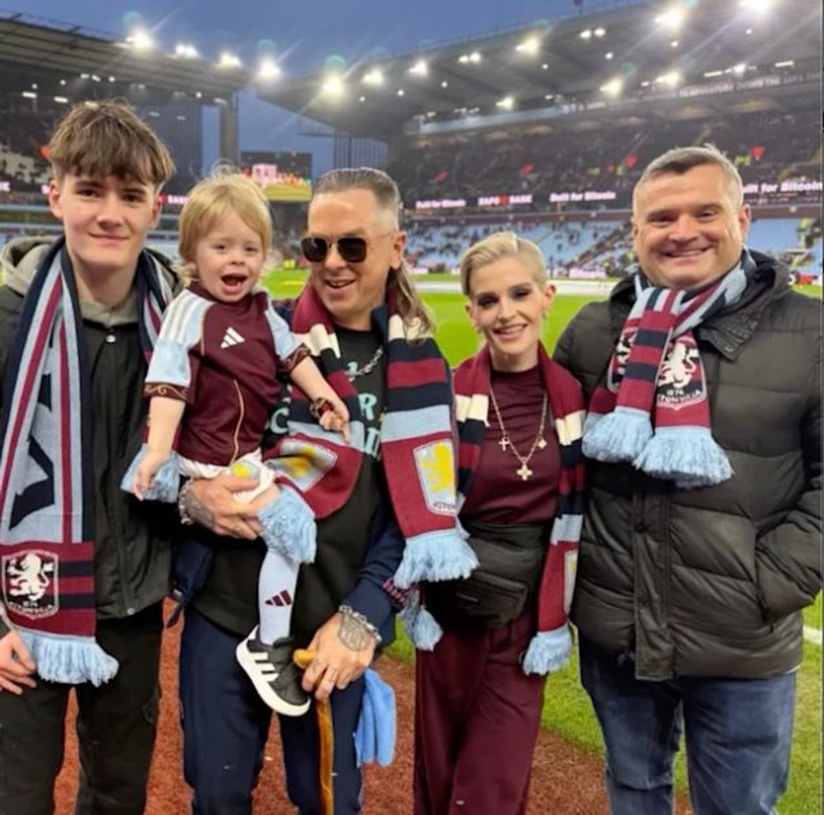 Ozzy Osbournes grandson steals show as mascot for Aston Villa - as mum Kelly reunites with her rarely-seen brother Louis